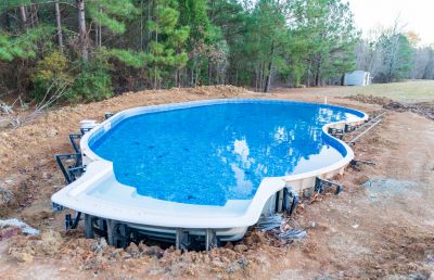 Get a Stylish and Practical Way to Enjoy Summer with a Semi Inground Pool Installation!